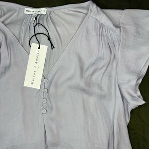 New with tags women’s medium blouse.